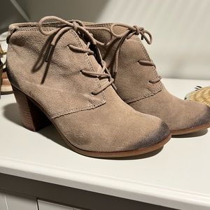 TOMS distressed heel boot.